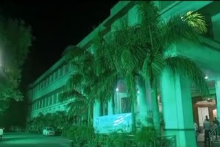 building decorated with green lights