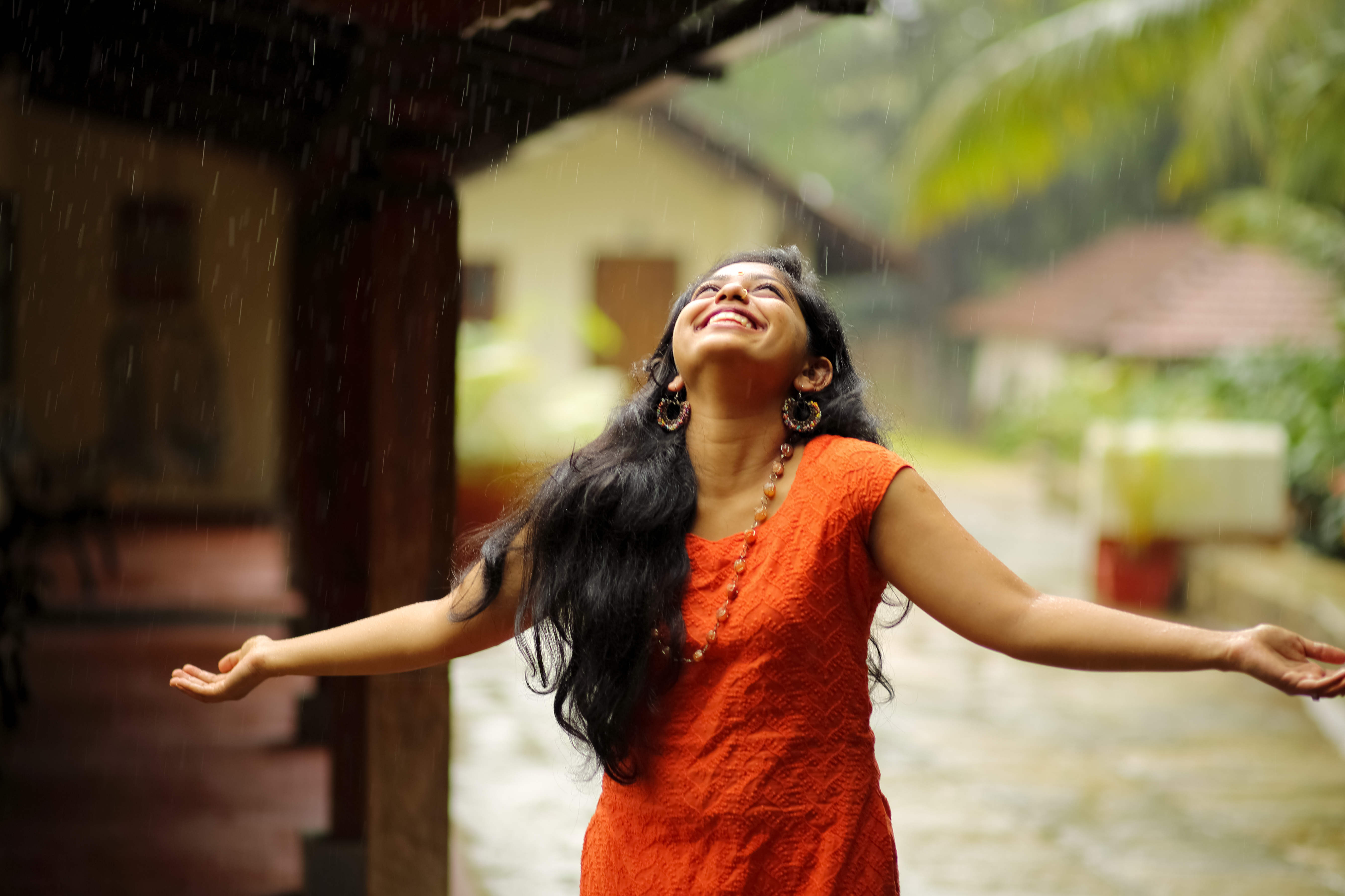 Girl Enjoying Rain