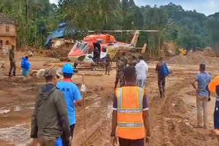 IAF HELICOPTER IN WAYANAD  DISASTER LAND HELICOPTER  ഹെലികോപ്‌റ്റര്‍ ദുരന്ത ഭൂമിയില്‍  എയർഫോഴ്‌സ് വയനാട് മുണ്ടക്കൈ