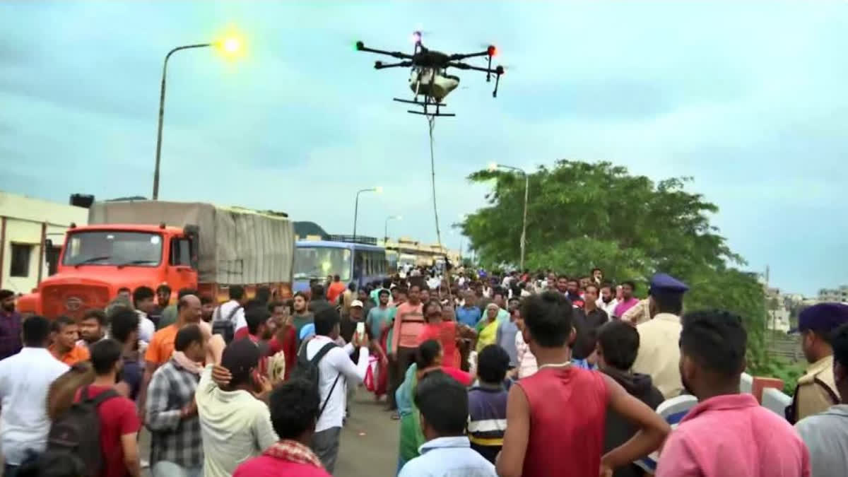 DRONES FOR FOOD SUPPLY IN AP  ANDHRA PRADESH FLOOD  ആന്ധ്രാപ്രദേശ് ഭക്ഷണ വിതരണം ഡ്രോണ്‍  ആന്ധ്രാപ്രദേശ് വെള്ളപ്പൊക്കം