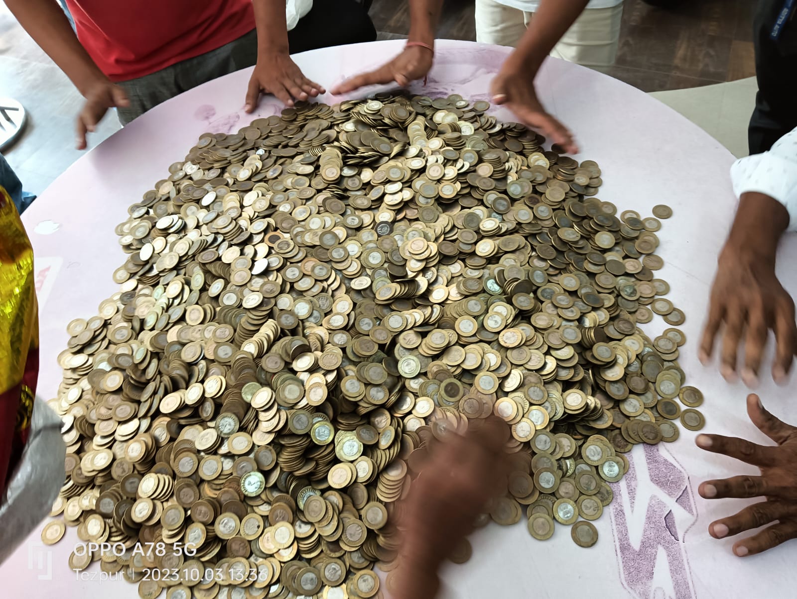 A shopkeeper buys a motorcycle with 1 lakh 9 thousand 700 coins