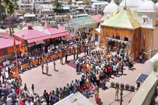 Devotees arrive to offer prayers at the Gangotri Dham