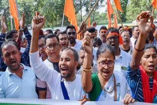 Sanatani Hindu Sena members and supporters stage a protest demanding the release of ISKCON monk and Bangladesh Sammilita Sanatani Jagran Jote spokesperson Chinmoy Krishna Das, in front of Bangladesh Assistant High Commission in Agartala on Tuesday.