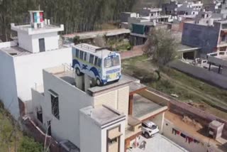 retired-employee-punjab-roadways-parked-government-bus-on-roof-of-house