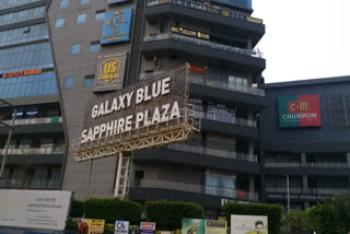 A day after two people died when a ceiling grill of a shopping mall fell from the fifth floor on them, the police on Monday ordered to close the Galaxy Blue Sapphire Mall located in Greater Noida West for security reasons.