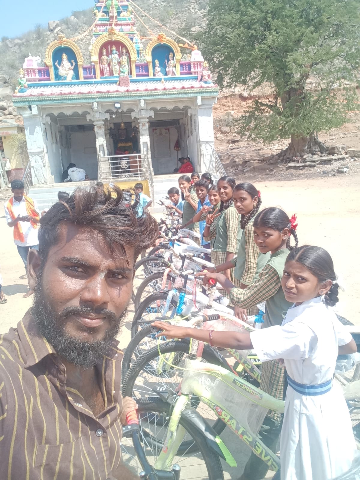 laborer donated bicycles  school  student  Raichur district