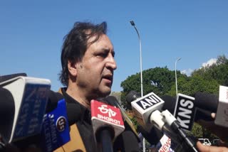 PC Chief Sajad Lone talks to the media after walking out of the Jammu and Kashmir assembly on the 2nd day of budget session in Jammu