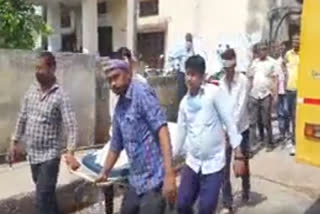 Relatives carrying the dead body of a habitual criminal from the hospital