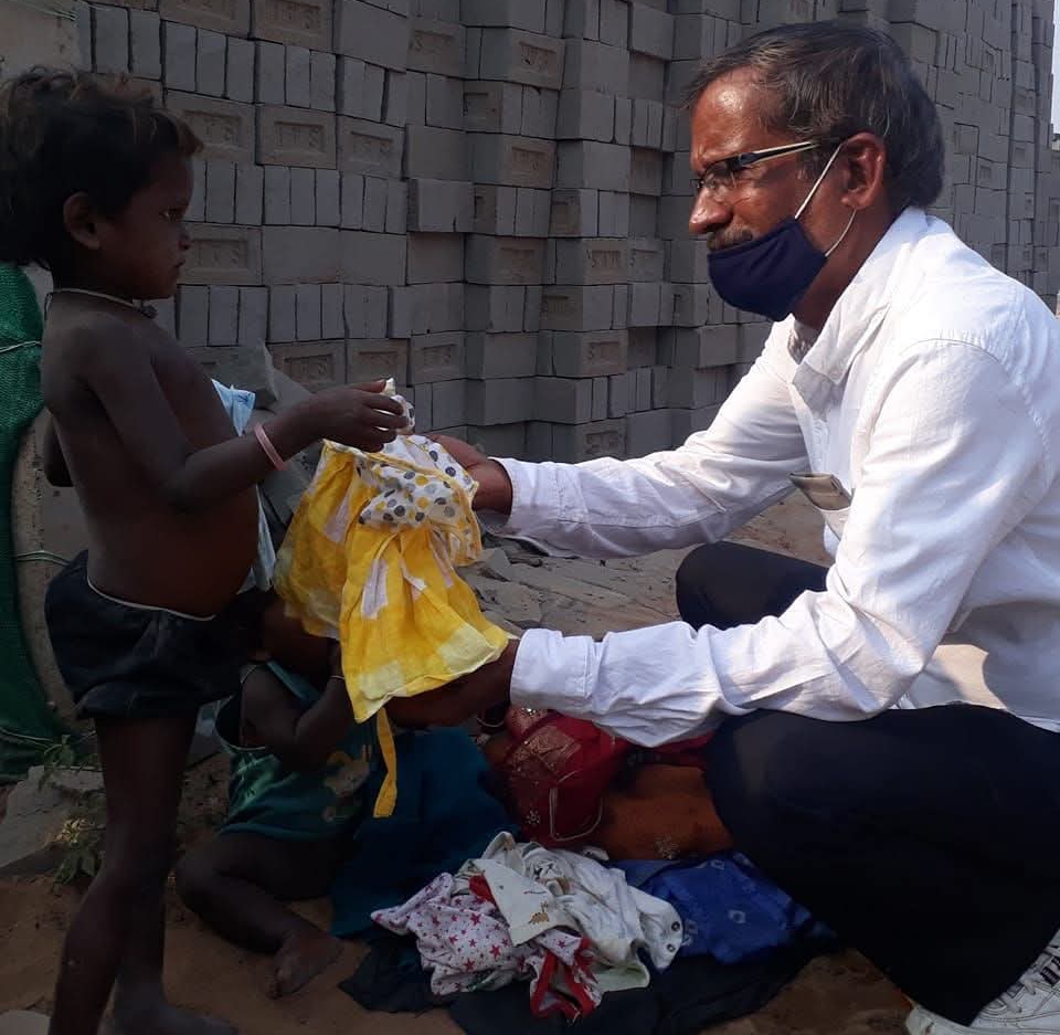 distributes things to needy