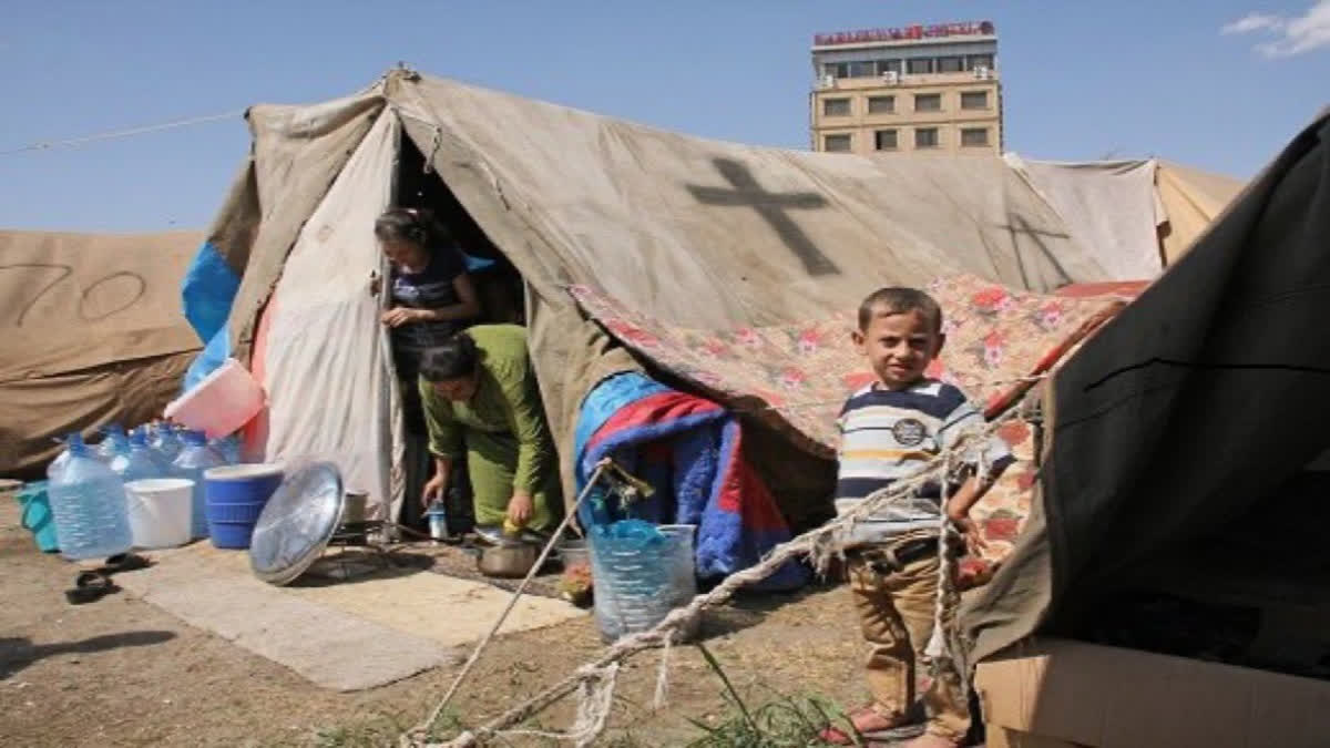 A feud between a patriarch and a militia leader adds to the woes of Iraqi Christians