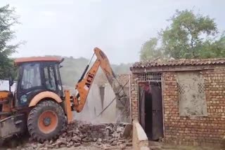 bulldozer action on illegal property in nuh