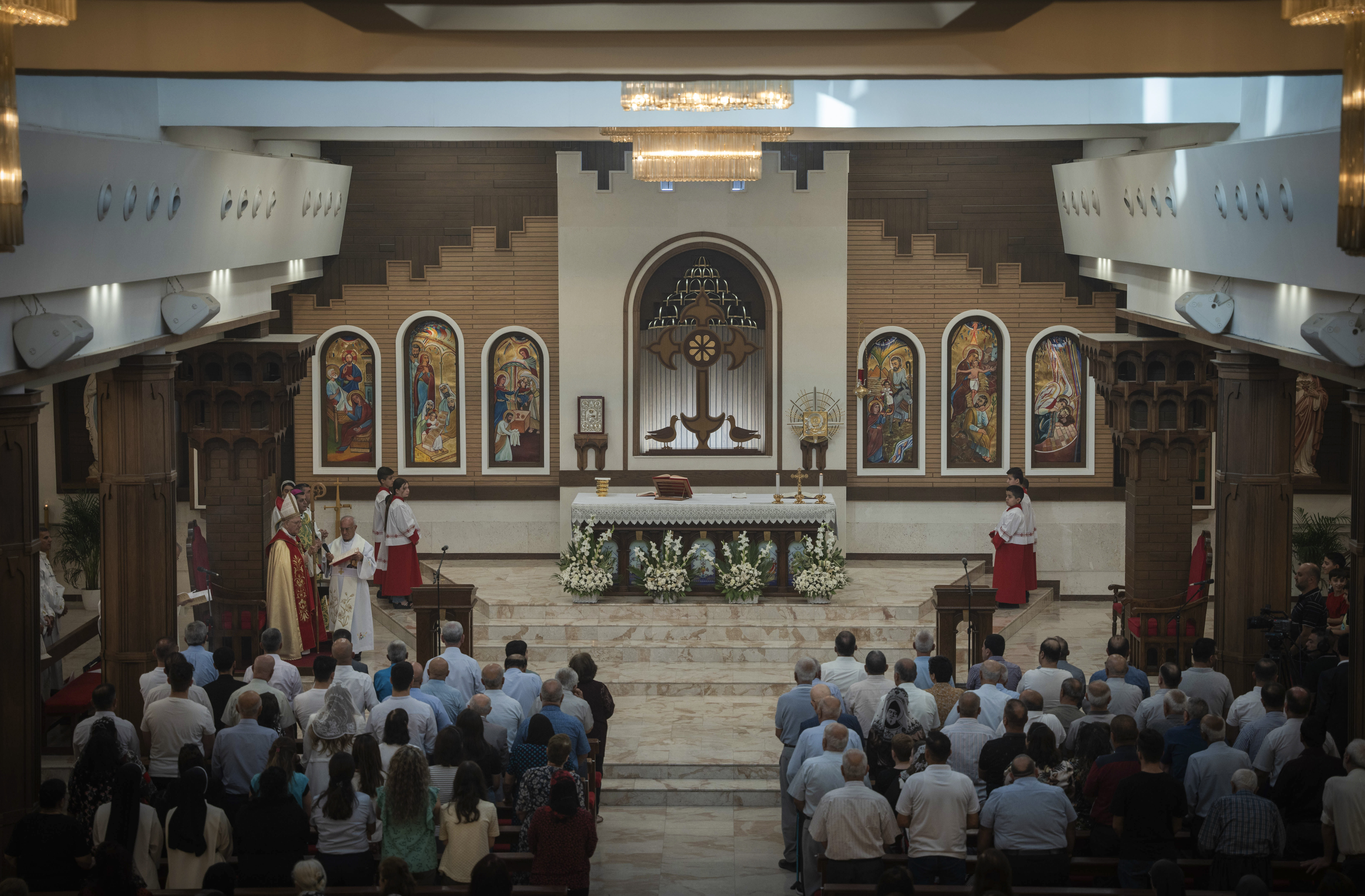 Iraqi Christians have struggled since the Nineveh plains, their historic homeland of rolling hills dotted with wheat and barley fields, were wrested back from Islamic State extremists six years ago. Although the threat from IS has receded, some towns are still mostly rubble. There are few inhabited homes or basic services, including water. Many Christians have given up and left for Europe, Australia or the United States. Others are trying to follow. Today, the number of Christians in Iraq is 150,000, compared to 1.5 million in 2003.