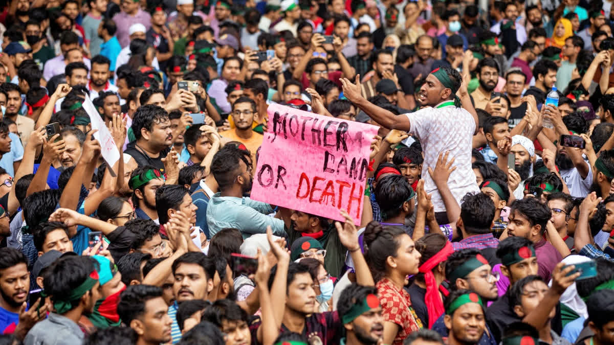 People participate in a protest march against Prime Minister Sheikh Hasina and her government to demand justice for the victims killed in the recent countrywide deadly clashes, in Dhaka, Bangladesh, Saturday, Aug. 3, 2024.