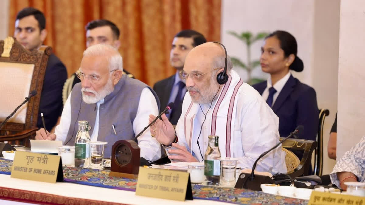 PM Narendra Modi and Home Minister Amit Shah during Conference of Governors in New Delhi on Saturday.