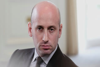 White House deputy chief of staff for policy Stephen Miller listens to President Donald Trump speak with the media during a meeting with Britain's Prime Minister Keir Starmer at the Trump Turnberry golf course in Turnberry, Scotland Monday, July 28, 2025.