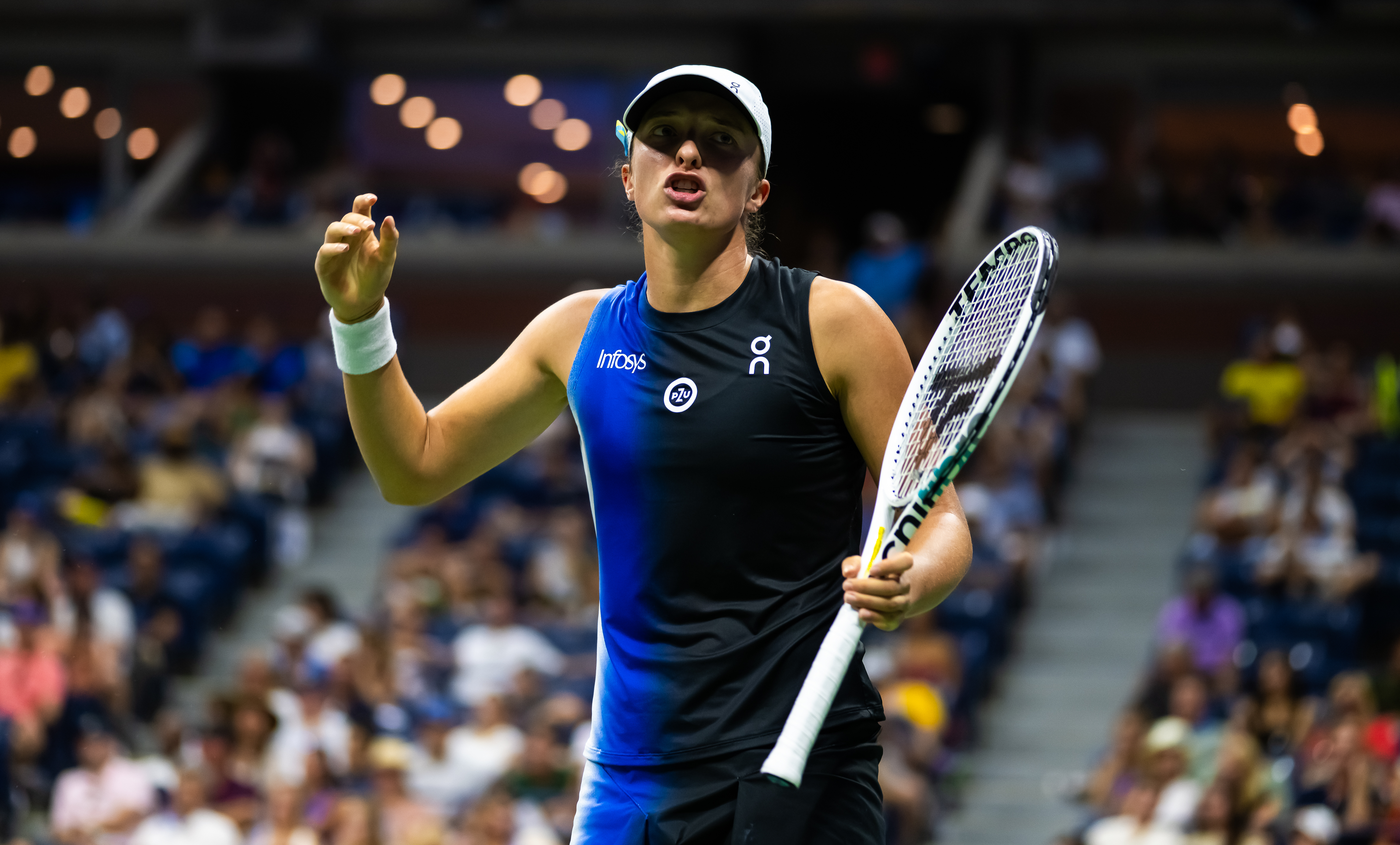 Defending champion Iga Swiatek exits US Open