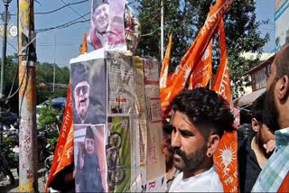 Members of Bajrang Dal protested against Farooq Abdullah for his comments against Indian Army