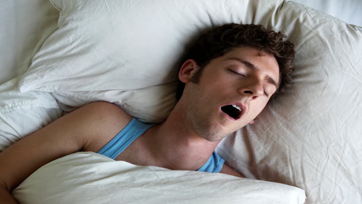 how to stop snoring naturally`