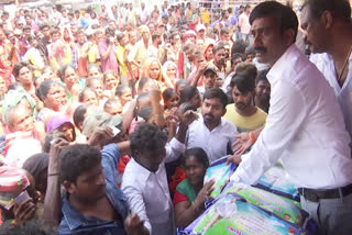 AP_Food_Commission_Member_Distributing_Gifts_to_People