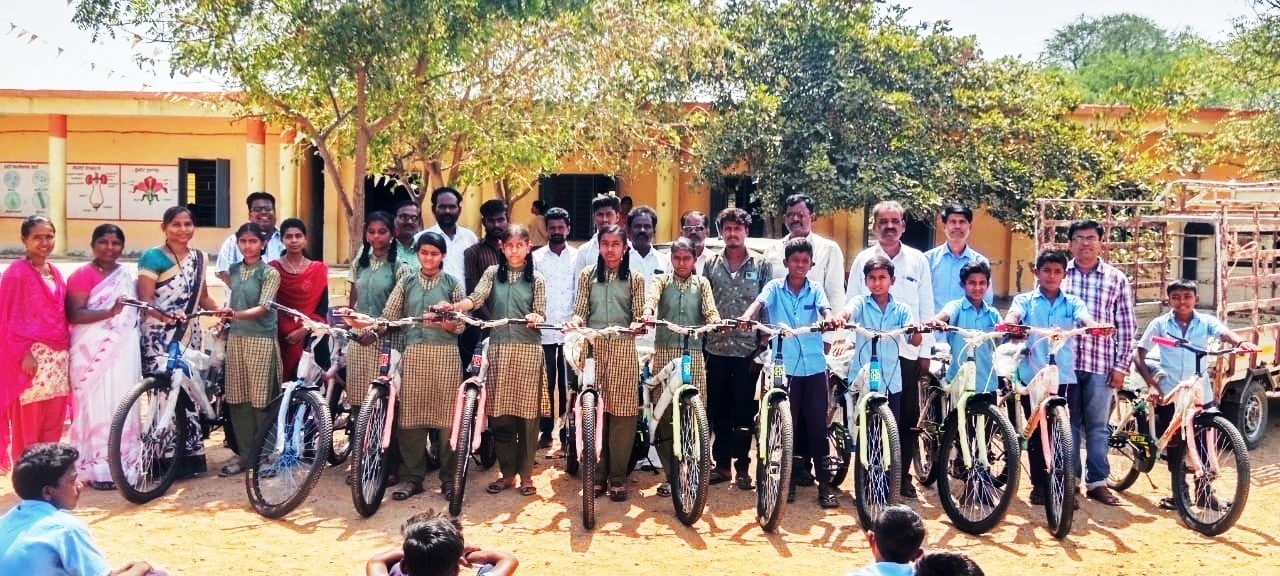 laborer donated bicycles  school  student  Raichur district