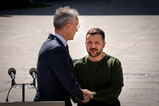 Ukrainian President Volodymyr Zelenskyy, right, welcomes NATO Secretary General Jens Stoltenberg during their meeting in Kyiv, Ukraine, Monday, April 29, 2024.