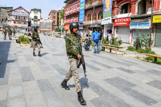 Paramilitary personnel patrol as security hightens in the valley following the Pahalgam terror attack, at Lal Chowk in Srinagar on Sunday.