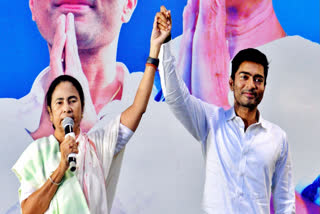 West Bengal Chief Minister Mamata Banerjee with TMC candidate from the Diamond Harbour constituency Abhishek Banerjee in Kolkata on Tuesday