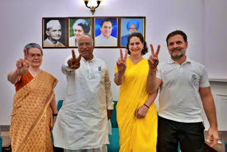 Congress President Mallikarjun Kharge with party leaders Sonia Gandhi, Priyanka Gandhi and Rahul Gandhi show victory signs amid the counting of votes for the Lok Sabha elections, at the party headquarters, in New Delhi, Tuesday, June 4, 2024.