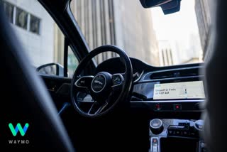 The front seat of Waymo’s autonomously driven Jaguar I-PACE