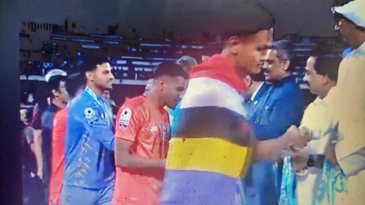 Jeakson Singh - hailing from Manipur and the defensive midfielder of Indian football team triggered a controversy after he was seen draped in vibrant seven-coloured flag representing the seven clan dynasties of the Meitei ethnicity of ancient Manipur over his jersey during the post-match ceremony of the 2023 SAFF Championship final on Tuesday night.