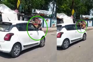 Woman Hanging on Bonnet