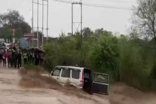 Scorpio car lying like straw in the river, water filled in houses and fields due to heavy rain
