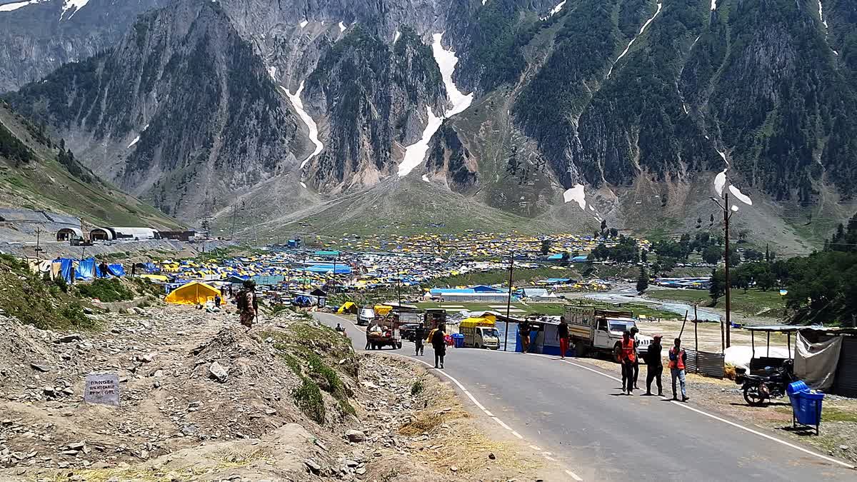 Pilgrims mounted on horseback on their way at Amarnath cave to offer prayers during their annual Amarnath Yatra