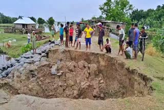 flood water breaching embankment in Bihpuria of lakhimpur