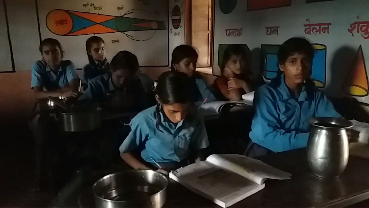 Students Sit With Glass In Masaurhi