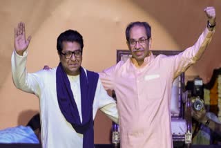 Maharashtra Navnirman Sena (MNS) chief Raj Thackeray, left, and Shiv Sena (UBT) chief Uddhav Thackeray during a joint victory rally, titled 'Awaj Marathicha', organised by the cousins, at Worli area, in Mumbai, Maharashtra, Saturday, July 5, 2025.