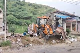 bulldozer action in nuh