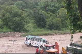 Bus overturned in Dhangarhi rain drain