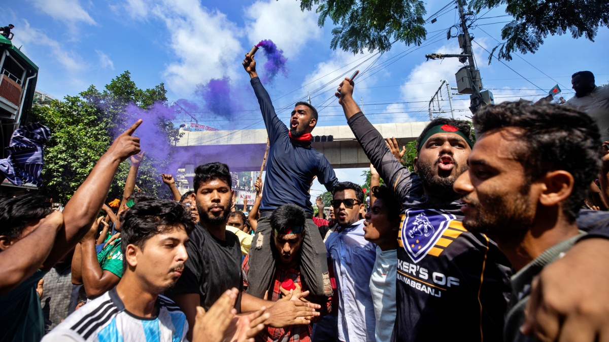 Protesters shout slogans as they celebrate after getting the news of Prime Minister Sheikh Hasina's resignation, in Dhaka, Bangladesh, Monday, Aug. 5, 2024.