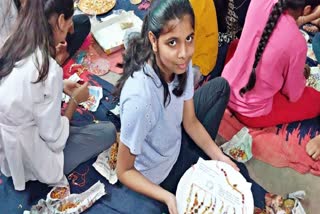 Girl students making rakhis