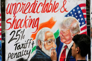 A student of Gurukul school of Art completes artwork of U.S. President Donald Trump and Prime Minister of India Narendra Modi, in Mumbai, India, Friday, Aug. 1, 2025.