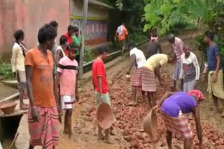 villagers repair road themselves