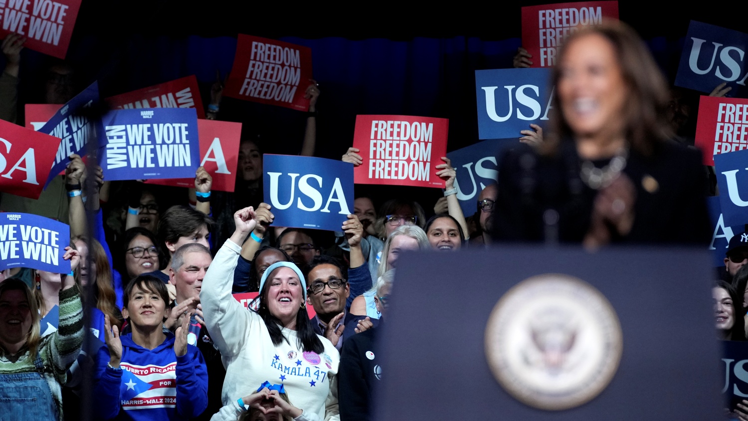 Supporters cheer as Democratic presidential nominee Vice President Kamala Harris speaks during a campaign rally in Memorial Hall at Muhlenberg College in Allentown, Pa., Monday, Nov. 4, 2024.