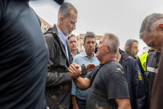 Amid flood devastation, King Felipe VI stands firm against protestors, earning praise for his composure, but risks confusion over his role in Spain's recovery efforts.