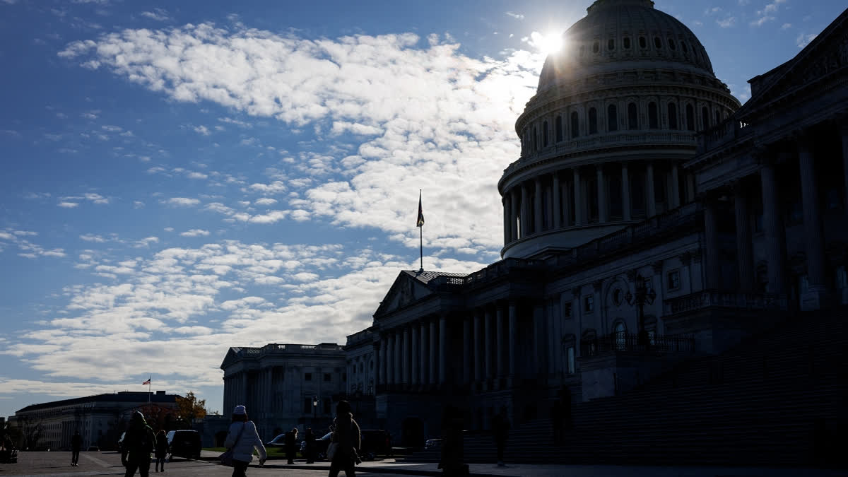 Visitors walk past the U.S. Capitol Building on December 2, 2024 in Washington, DC.