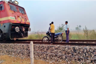 Person Ride Bike Towards a Train