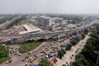 Aerial view of a blue line metro running on its track after the metro services resume on the Blue line.