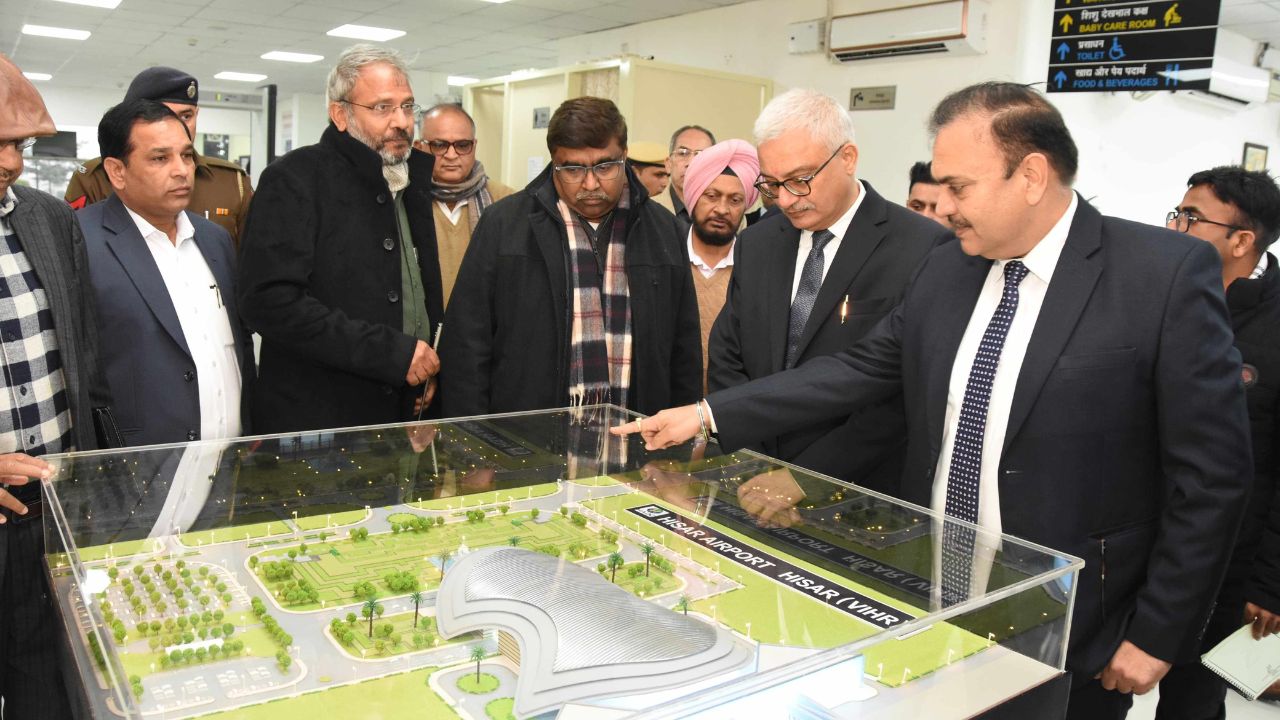 Vivek Joshi talking to officials