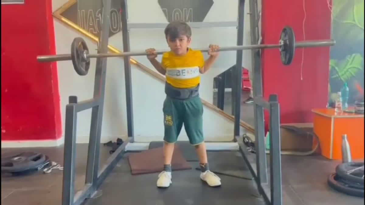 A 6-year-old from Surat in Gujarat is showing his skills in the power lifting while practicing with Olympic Barbells and heavy plates.