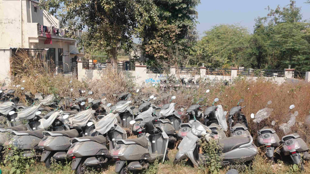 Girls Students waiting for Scooty